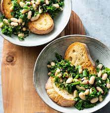 Garlicky Beans And Greens Over Toast Savory Recipe Fast Dinners Vegetarian Recipes Beans On Toast