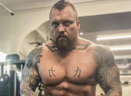 Exactly what it says on the tin. Strongman Eddie Hall Leaves Former Gb Gymnast Nile Wilson Sprawled Out On Floor After Punch Daily Star