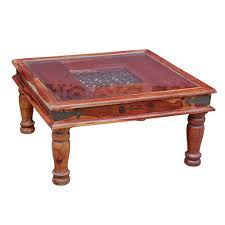 Or, sometimes customers will use our round glass table tops as a cover for an antique that they want to keep protected from spills, scratches, glass rings and other damage. Indonesian Teak And Iron Glass Top Coffee Table