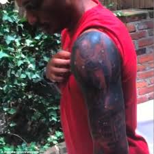 Manchester united's bruno fernandes, left, scores his side's opening goal from the penalty spot during the english premier league soccer match between leicester city and. Thierry Henry Shows Off New York Themed Tattoo Daily Mail Online