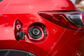 Experts suggest that finding the best diesel fuel additive for your diesel engine depends on several factors, including your vehicle's make and model and the type of additive. An Open Fuel Tank Cap Of A Red Car For Filling Gasoline Or Diesel Fuel Into The Gas Tank The Back Of The Car With An Open Gas Tank Stock Photo Picture