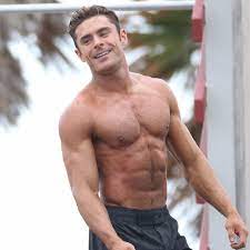 Next to his trending haircuts, zac efron's washboard abs are all the rage. Zac Efron Shirtless Baywatch Movie Set Pictures Popsugar Celebrity