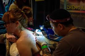 Michael — black + blue tattoo. 2019 Motor City Tattoo Expo Attracts Ink Lovers From Around The World