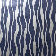 Navy blue and silver metallic geometric tiled wallpaper. Metallic Wave Wallpaper Arthouse Silver Navy Textured Glitter Vinyl Modern