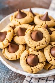 Tender peanut butter cookies, made from scratch in a recipe that comes together quickly, are the once they're out of the oven, hershey's kisses are immediately pressed into the warm cookies so. Peanut Butter Kiss Cookies Hershey Kiss Cookies Video