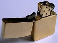 It consists of a metal or plastic container filled with a flammable liquid or compressed gas, a means of ignition to produce the flame, and some provision for extinguishing the flame. Zippo Wikipedia