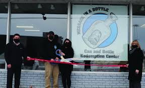 Message in a Bottle ribbon cutting