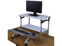 While those changes are being made, a shelf was also added so that a printer and office supplies have a place to sit. Lift Standing Desk Converter Tall Adjustable Height Portable Affordable Sit To Stand Up Desktop Riser Conversion Stand With Negative Tilt Keyboard Tray White Desk And Silver Keyboard Tray Newegg Com