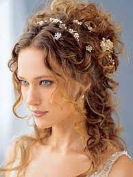 Curly and feminine, this wedding hairstyle is ideal for a variety of hair types. Curly Wedding Hairstyles Wedding Hair Style