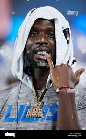 Detroit Lions safety Kerby Joseph (31) shows off his grill during an NFL  preseason football game against the Carolina Panthers, Friday, Aug. 25,  2023, in Charlotte, N.C. (AP Photo/Brian Westerholt Stock Photo