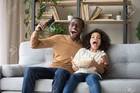 Beautifully crafted soccer sofa available at extremely low prices. Overjoyed Black Family Sitting On Sofa Watch Football Sport Tv Stock Photo Picture And Royalty Free Image Image 122245232
