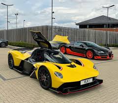 Image result for Sunburst Yellow 2017 Aston Martin