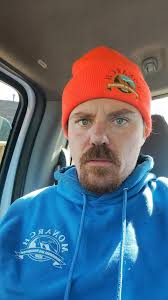 On lunch break, face covered in dust from blowing leaves