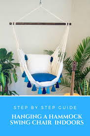 You and your spouse can fit into this hanging chair when you're done building it and have a good time together. How To Hang A Hammock Chair Indoors Diy Tips Indoor Hammock Chair Diy Hammock Diy Hammock Chair