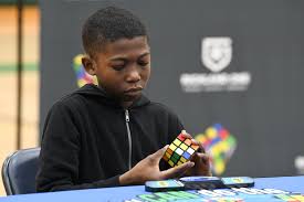 The youngest person who solved a rubik's cube in a competition was ruxin liu (china), who was 3 years 118 days old when she solved the cube in 1:39.33 at the weifang open. Richland One Cubing Craze Continues At December 7 Competition