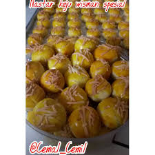 Kue nastar sendiri identik dengan kue lebaran yang cukup banyak dipajang di meja Kue Nastar Nanas Dan Wisman Spesial Shopee Indonesia
