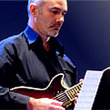 13 Guitarist Steve Smith. Photograph available at:...