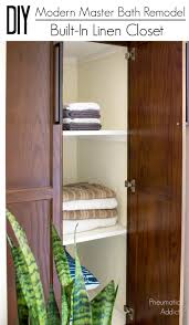 Tall and slender linen cabinet is a perfect piece of furniture for a bathroom or living room. Modern Master Bath Remodel Part 5 Built In Linen Closet Pneumatic Addict