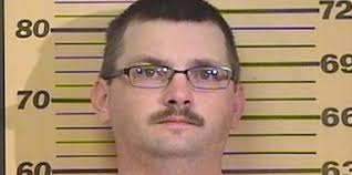 Two charged after failing to inform police of firearms