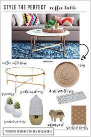 Decorating A Coffee Table Can Be Both Magazine Beautiful And Practical For Family Life Just Round Coffee Table Styling Coffee Table Coffee Table Arrangements