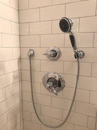Delta Victorian Shower Fittings With Large White Subway And Platinum Grout Shower Fittings Door Handles Fittings