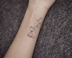 Pin By Allison Portillo On Tattoos Hourglass Tattoo Small Girly Tattoos First Tattoo