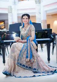 Gold Blue Wedding Dress I Would Prefer Gold And Pink Lehenga Muslimwedding Www Perfectmuslimwedd Pakistani Wedding Dresses Bridal Dresses Walima Dress