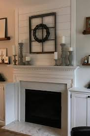 15 Mantel Decor Ideas For Above Your Fireplace Overstock Com Above Fireplace Decor Fireplace Mantel Decor Fireplace Design