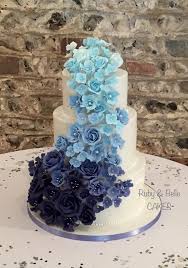 Beautiful 3 Tier Wedding Cake With Blue Ombre Cascade Of Flowers Created By Ruby Belle Cak Wedding Cake Fresh Flowers Wedding Cake Prices Wedding Cake Ombre