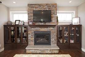 The fireplace will show a realistic fire experience with log set and ember bed. Fireplace Mantel Decor Ideas How To Decorate Your Fireplace And The Space Around It Home Design Tips And Cabinetry Solutions Twin Cities Mn The Cabinet Store