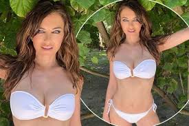 In the 1990s, hurley became known as the girlfriend of hugh grant. Liz Hurley 54 Stuns In Bikini After Saying She S Too Old For Skimpy Swimwear Mirror Online