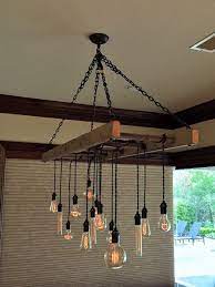 Ladder Pot Rack Converted To Chandelier By Client Ladder Chandelier Chandelier Design Cool Chandeliers