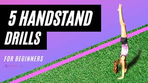 A position, as in gymnastics or yoga, in which one supports oneself vertically on one's head with the hands braced for support on the floor or on a mat. 5 Handstand Drills For Beginners