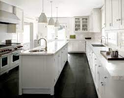 Dark wood cabinets are a timeless option to own in every type of kitchen, either modern or with a classic design. 120420 06 Slate Floor Kitchen Slate Kitchen Kitchen Remodel