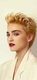 The sides of the hair are apparently longer flowing down the shoulders. 10 Awesome 80s Hairstyles For Short Hair In 2021 80s Short Hair Short Hair Images 80s Hair Short