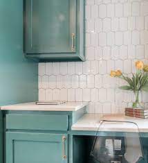 The homeowners wanted to enhance their original cabinets and hardware, which they did with the flat edges' new atomic series. Mid Century Modern Style The Tile Shop Blog