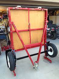 Haul master folding utility trailer : Folding Trailer In Folded Position Ready For Storage Unfold It And Hook It Up When You Need A Trailer To Hau Kayak Trailer Motorcycle Trailer Utility Trailer