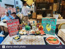 Download This Stock Image A Table Full Of Food And Drinks Related To The Milanese Tradition Of The Aperitivo In The Evenings Jbyb Stock Photos Milanese Food