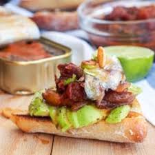 First, we mash up a couple chunks of avocado. Sardine Toast With Avocado Tomato Relish And Garlic Chips Gf Df Avocado Pesto