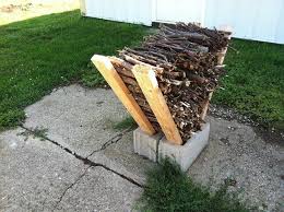Diy Easy Outdoor Firewood Rack From Cinderblocks Outdoor Firewood Rack Backyard Fire Diy Fire Pit