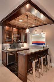Opt for glass shelves to complement the look of the room. Contemporary Homes Are All About Incorporating Every Little Detail That Is To The Taste Of Those Who Liv Bars For Home Basement Bar Designs Basement Remodeling
