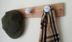 This listing is for one individual coat hook. Golf Ball Coat Hook