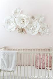 I've always got flowers on the brain! Paper Flowers As Wall Decor In A Nursery What A Gorgeous Soft Feminine Space Almost All Neutral Paper Flower Wall Art Paper Flower Wall Flower Wall Decor