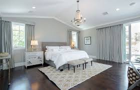 Planning to renovate your floor? Master Bedroom With Silver Wall Covering And Decor With Walnut Floors Bedroom Wood Floor Luxury Bedroom Master Luxe Bedroom
