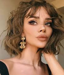 Ever wondered how you can make curly hair bangs work for you? 11 Charismatic Short Curly Hairstyles With Bangs For Women