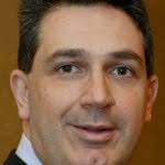 Dr. John F. Como, DDS