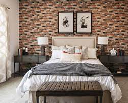 Brick veneer accent wall in attic. A Brick Accent Wall Created Such A Huge Statement In This Master Bedroom Dream Master Bedroom Home Master Decor