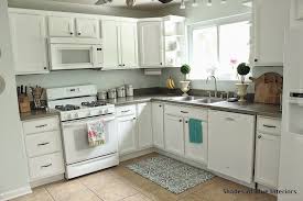Makeover Monday I Painted My Kitchen Cabinets Shades Of Blue Interiors Painting Kitchen Cabinets White Painting Kitchen Cabinets White Kitchen Inspiration
