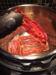 Could always cook the bacon in your oven at home (assuming you have an oven at home). Instant Pot Bacon Melanie Cooks