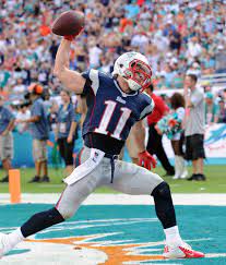 New England Patriots Wide Receiver Julian Edelman Celebrates A Touchdown In New England Patriots Players New England Patriots Football Patriots Julian Edelman